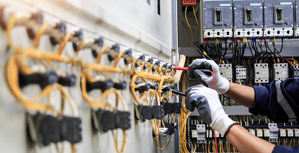 Professional Electrician technician working in Forest Oaks, NC